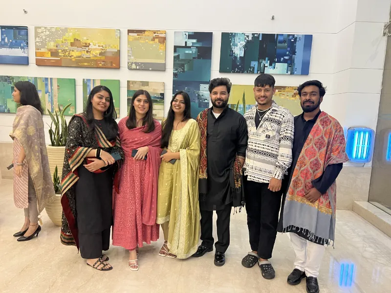 UIUX Studio team at a festival celebration in the office