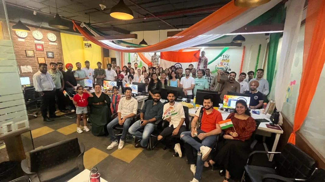 UIUX Studio team gathered in the office decorated in Indian tricolour