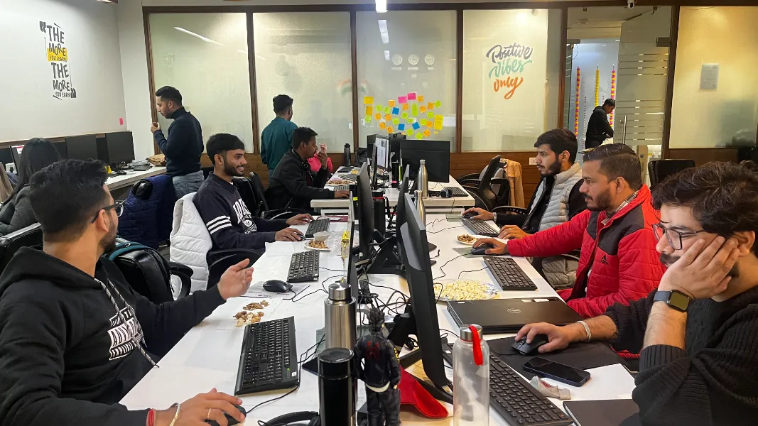 UIUX Studio designers and developers working in the office