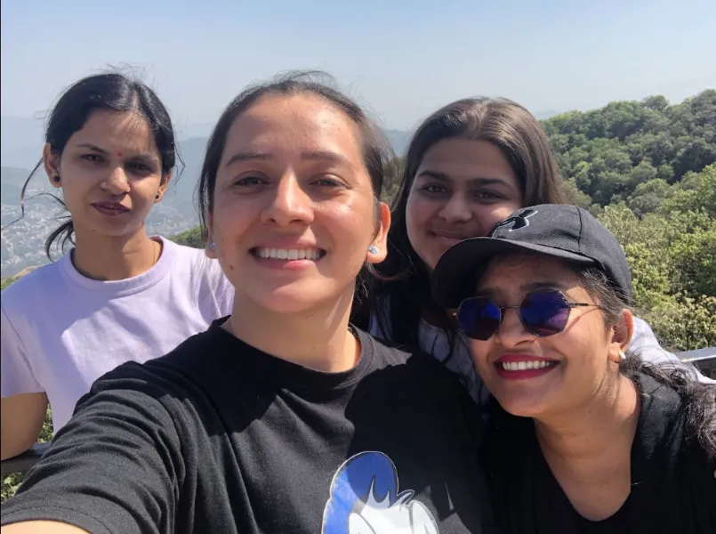 UIUX Studio team selfie on an outing in the hills