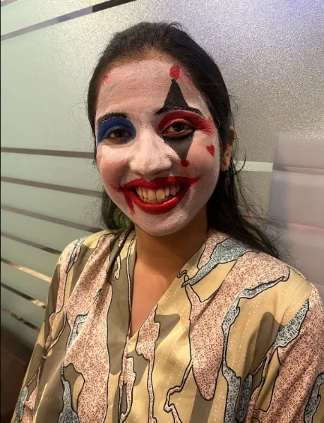 UIUX Studio team member in Halloween face paint