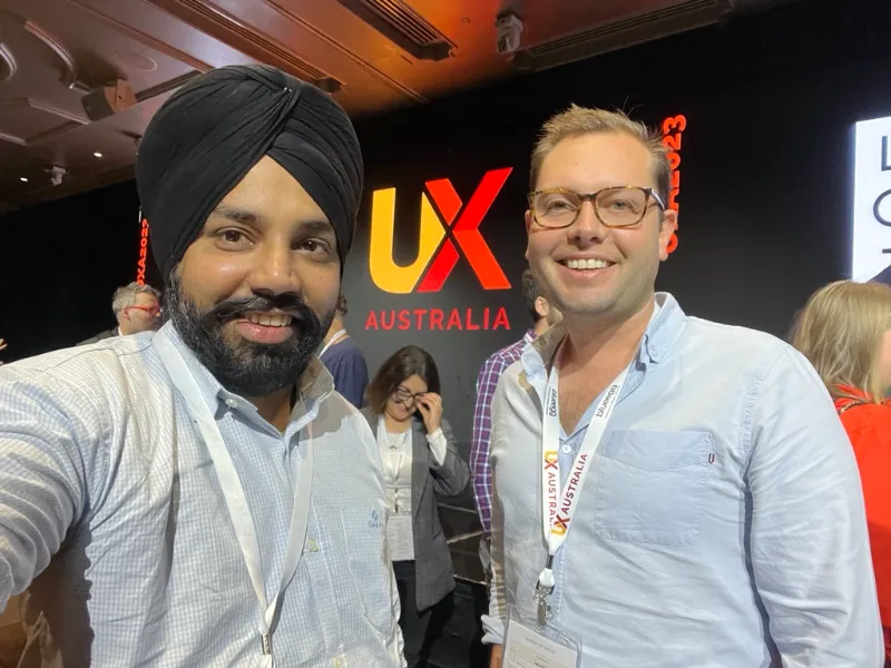 Two UIUX Studio team members at the UX Australia conference