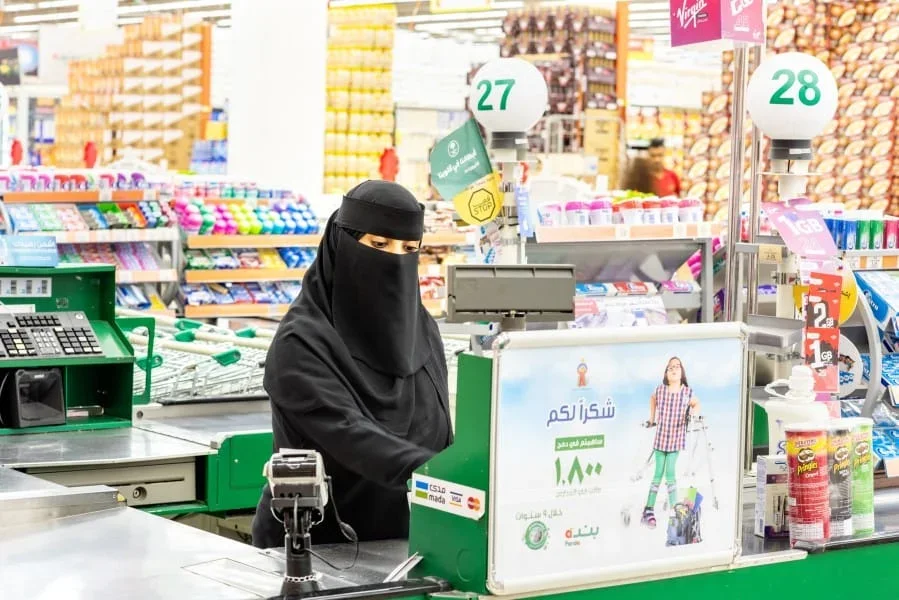 Cashier at the till